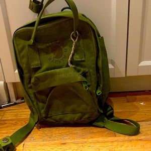Fjallraven kanken backpack in forest green.  Mini kanken